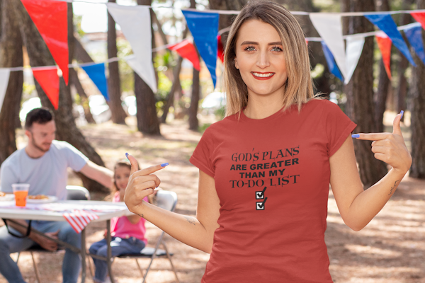 Gods Plans image of a woman at a picnic wearing a red shirt