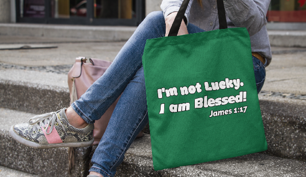green tote bag on a step not lucky blessed
