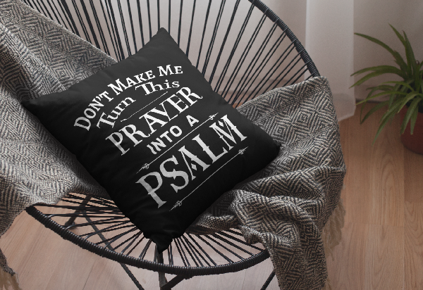 black throw pillow on a chair