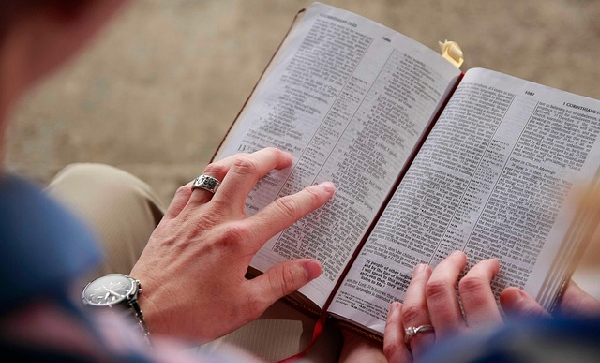 what is biblical faith-couple reading a Bible